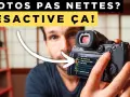 Un homme ajuste les réglages d'un appareil photo, l'écran affiche "Rec. File Format". Il désactive l'auto focus pour des photos nettes.