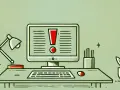 Biurko z komputerem, na ekranie wykrzyknik. Może to być ostrzeżenie dotyczące systemu e-przewóz.