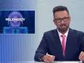 Prowadzący "Milionerzy" pyta: "Ile kosztuje zwykły bochenek chleba?". Na ekranie widać opcje odpowiedzi.