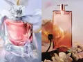 Dwa flakony perfum: różowy "La Vie Est Belle" otoczony białymi kwiatami i pomarańczowy "Idôle" na tle kwiatów i skał.