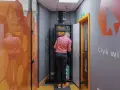 Technician working on network infrastructure services in a server room.