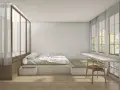 Camera da letto minimalista con letto feng shui, tatami, scrivania a muro e grandi finestre con vista su alberi.