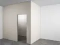 Niedokończona ściana z płyty gk, z otworem drzwiowym. Zastanawiasz się, ile waży płyta gk?