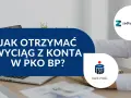 Jak pobrać wyciąg z konta ipko? Na zdjęciu widać biurko z laptopem, dokumentami i kalkulatorem.