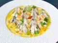 Cocochas de bacalao en salsa de ajo y perejil, un plato delicioso y fácil de preparar.