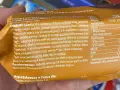 Pomarańczowe delicje kcal: biszkopt z galaretką i czekoladą. Na opakowaniu podano składniki i wartości odżywcze, w tym 275 kcal na 100g.