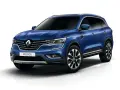 Niebieski Renault Koleos II, który może mieć pewne **awarie i problemy**, prezentuje się elegancko na białym tle.