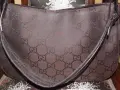 Brązowa torebka Gucci vintage z monogramem GG. Klasyczny dodatek, który nigdy nie wychodzi z mody.