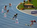 Start biegu na 400 m kobiet. Zawodniczki w blokach startowych, gotowe do rywalizacji.