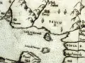 Fragment starej mapy ukazujący wybrzeże z zaznaczonym miastem Benin. Widać góry, rzeki i wyspy, jak Isola de Fernando Paon. Benin dawniej.