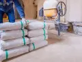 Ile cementu potrzebujesz do betoniarki 100l? Proporcje i wskazówki