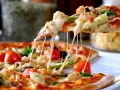 Co na pizzę? Odkryj najlepsze składniki i sekrety idealnej pizzy!