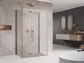 Nowoczesna łazienka z prysznicem walk-in i miedzianymi detalami. Czekamy aż silikon sanitarny wyschnie, by cieszyć się idealną szczelnością.