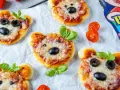 Niedliche mini pizza-Bären mit Oliven und Basilikum.