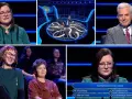 Uczestnicy programu "Milionerzy o której godzinie" odpowiadają na pytania. Widać prowadzącego, uczestników i planszę z pytaniem.