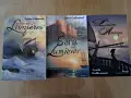 Trois couvertures de roman historique de Lynda Guillemaud : "Le vent des Lumières", "Le Sang des Lumières" et "Les Lumières d'Amérique".