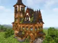 Una mansión de Minecraft con torre alta, tejados de pizarra y madera, rodeada de un paisaje verde y frondoso.
