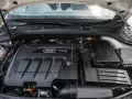 Pod maską Audi widać silnik 2.0 TDI.