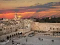 Sunset over Jerusalem's Old City, with the Dome of the Rock and the Western Wall, a glimpse of Solomon's Temple today.