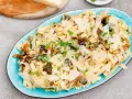 Tagliatelle z grzybami, posypane parmezanem i natką pietruszki. Pyszny przepis na makaron z leśnymi grzybami.