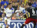 Jugadores de Central y River en acción. El partido se vive con intensidad en la cancha.