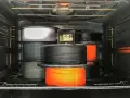 Szpule filamentu do druku 3D, materiał higroskopijny, suszone w piekarniku. Termometr pokazuje 52.8°C.