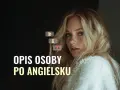 Młoda kobieta z blond włosami i piegami. Tekst "OPIS OSOBY PO ANGIELSKU" i emoji twarzy, nosa i ust.