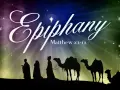 Silhouettes of the Three Wise Men on camels journey under a starry sky, illustrating Catholic homilies on the Epiphany.