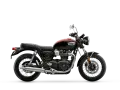 Klasyczny motocykl Triumph Bonneville T100 w czarno-czerwonej kolorystyce. Szczegółowe dane techniczne dostępne dla tego modelu.