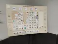 Ein gemeinsamer Kalender App mit Icons für tägliche Aufgaben wie Kindergarten, Sport und Arztbesuche.