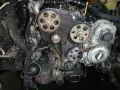 Silnik 1.9 TDI z widocznym rozrządem. Planujesz wymianę rozrządu 1.9 tdi? Koszt takiej usługi zależy od wielu czynników.