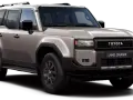Szary Toyota Land Cruiser 300 z czarnym grillem i napisami TOYOTA LAND CRUISER.