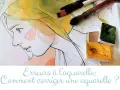 Dessin d'aquarelle d'un profil féminin, avec des pinceaux et des pastilles de couleur.