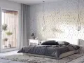 Przytulna sypialnia inspiracje: biała cegła, duże okno z widokiem na balkon, drewniana podłoga i miękki dywan tworzą relaksującą atmosferę.