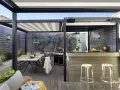 Porche moderno con mesa, parrilla y una barra de bar, ideal para disfrutar de una cocina exterior.