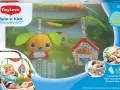 Pałąk Tiny Love Spin 'n' Kick z zabawkami dla niemowląt. Wesoły piesek i domek zachęcają do zabawy.