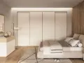Camera da letto scandinava con letto accogliente, armadio a scomparsa e comò in legno chiaro. Un'oasi di pace in stile nordico.