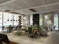 Nowoczesny salon z wygodnymi sofami, stolikami i dziełami sztuki na ścianach. Idealne miejsce na **puro** relaks.