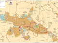 Mapa kompleksu leśnego Lasy Kozłowieckie z zaznaczonymi szlakami, rezerwatami i obiektami turystycznymi.