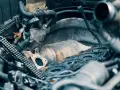 Parti del motore con filtro antiparticolato (FAP) sporco, causa comune perché si intasa il fap.