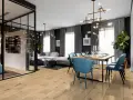 Nowoczesny salon z jadalnią, gdzie drewniana podłoga kronostep tworzy ciepłą bazę dla błękitnych krzeseł i eleganckiej jadalni.