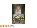 Un perro feliz sonríe en la portada de "Adiestramiento Canino en Positivo", un manual para el entrenamiento de perros.