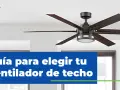 Guía para elegir tu ventilador de techo. Un ventilador moderno de seis aspas de madera oscura cuelga del techo, con una luz integrada.