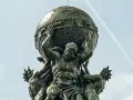 Atlas, punished for his role in the Titanomachy, bears the weight of the world. This bronze sculpture depicts him straining under the celestial sphere.