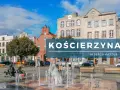 Rynek w Kościerzynie, z fontanną i rzeźbą, zaprasza do odkrywania kaszubskich atrakcji.