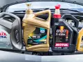 Producent olejów silnikowych: cztery różne marki (Shell, Eurol, Motul, Havoline) w opakowaniach gotowe do użycia.