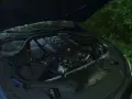Silnik BMW z napisem "M Performance" gotowy do generowania potężnego momentu obrotowego.