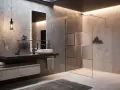 Salle de bain moderne avec douche à l'italienne. Lavabo suspendu, miroir éclairé et paroi de douche en verre strié.
