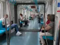 Passengers ride the Bosphorus Express metro, enjoying a comfortable journey through the city.