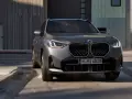 Nowoczesne BMW X3 w szarym kolorze, z charakterystyczną atrapą chłodnicy i światłami LED. Sprawdź aktualną bmw x3 cena!